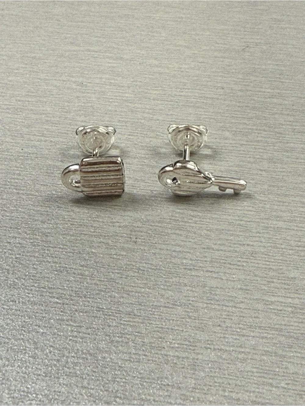 Uno de 50 Silver Unlock Stud Earrings